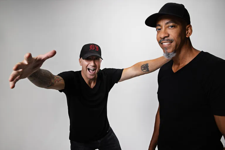 Babae and Dynamixx having fun in a promotional portrait